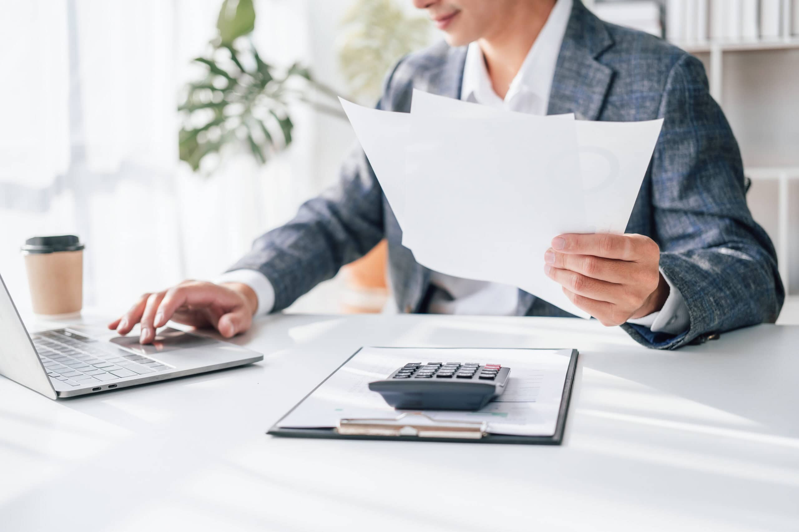 Portrait of bookkeepers asia business man working on tax consult